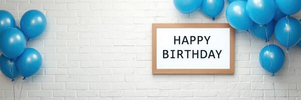 Celebration with blue balloons and a birthday sign set against a brick wall in a festive atmosphere photo