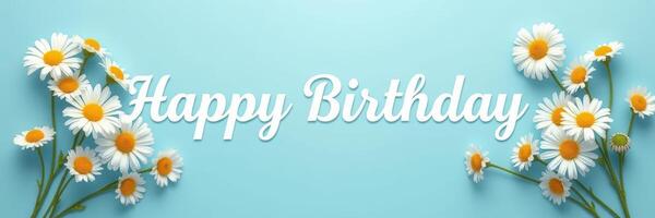 Happy birthday celebration design featuring white daisies on a blue background with elegant typography photo