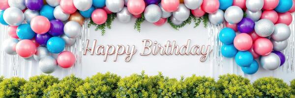 Colorful birthday decoration with balloons and greenery for a festive celebration photo
