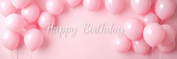 Colorful pink balloons create a cheerful atmosphere for a birthday celebration photo