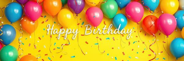 Brightly colored balloons and confetti create a festive atmosphere for a birthday celebration photo