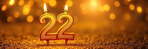 Celebratory candles lit for a special occasion on a sparkling background full of warm lights photo