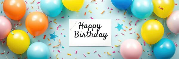 Colorful birthday celebration decorations with balloons and confetti on a pastel background photo