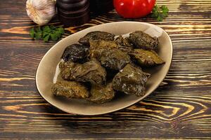 Stuffed dolma - meat in grape leaves photo