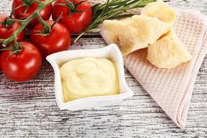 Cheese sauce in the bowl photo