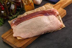 Raw duck breast for cooking photo
