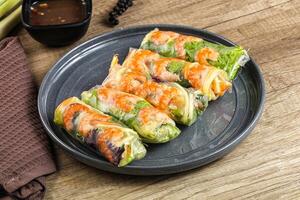 Vietnamese spring roll with prawn and mango photo