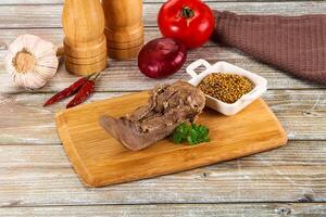 Steamed pork tongue with mustard photo