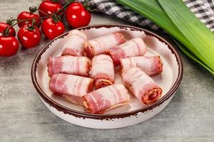 Fresh raw pork bacon roll photo