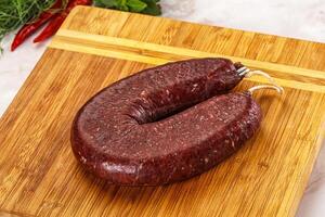 Delicious dry cured beef basturma on table, closeup photo