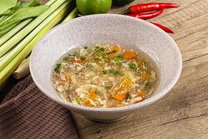 Asian gourmet crab soup with spices photo