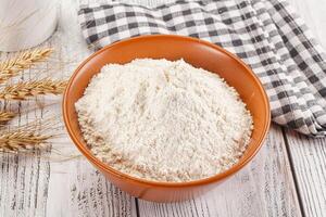 Wheat flour heap for bake photo