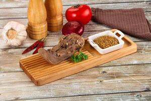 Steamed pork tongue with mustard photo