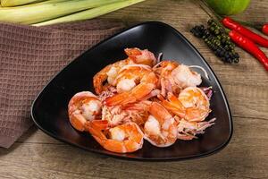 Shrimp cocktail with salad and sauce photo