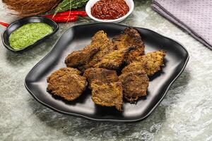 Grilled beef barbecue with spises photo