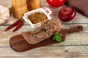 Steamed pork tongue with mustard photo
