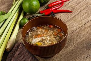 Asian gourmet crab soup with spices photo