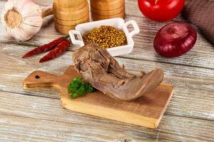 Steamed pork tongue with mustard photo