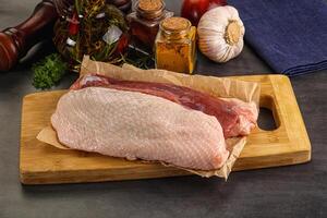 Raw duck breast for cooking photo