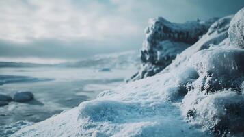 A snowy mountain with a frozen lake in the background photo