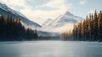 A beautiful mountain range with a lake in the foreground photo