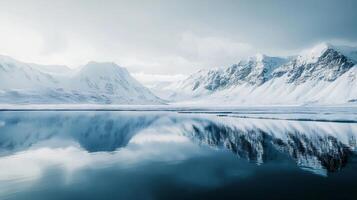 A beautiful blue lake with mountains in the background photo