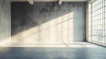 A large, empty room with a window and a wall photo