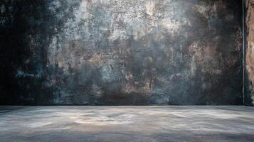 A large, empty room with a grey wall photo