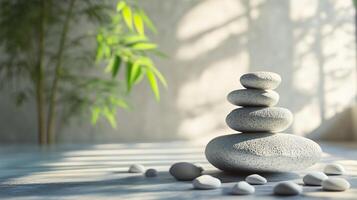 A stone pyramid is placed on a table with a potted plant in the background photo