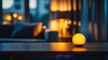 A small yellow light sits on a wooden table in a dimly lit room photo