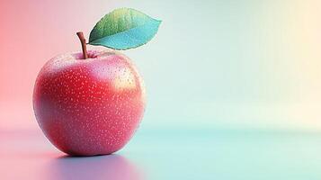 A red apple with a green leaf on top photo