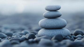 A stack of rocks on a beach photo