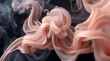 Abstract swirling patterns of peach and gray ink in water video
