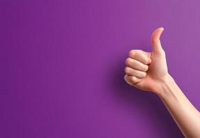 Positive gesture of approval on a vibrant purple backdrop symbolizes satisfaction and encouragement for reviews and feedback in creative designs photo