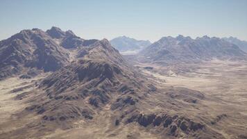 An aerial view of a mountain range in the desert video