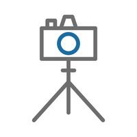 Camera on a tripod icon. Concept of photography, videography, and filmmaking. vector