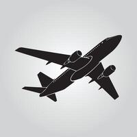 A clean, straightforward silhouette of a jet airplane in flight against a light gray background. vector