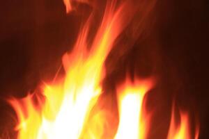 Fire Flames With A Black Background. photo