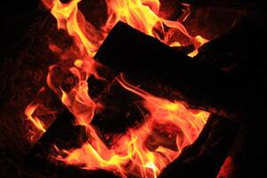 Fire Flames With A Black Background. photo