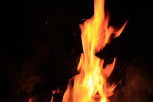 Fire Flames With A Black Background. photo