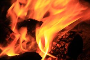 Fire Flames With A Black Background. photo