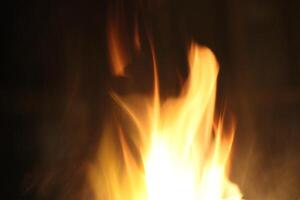 Fire Flames With A Black Background. photo