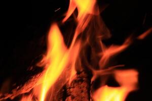 Fire Flames With A Black Background. photo