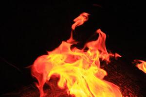 Fire Flames With A Black Background. photo