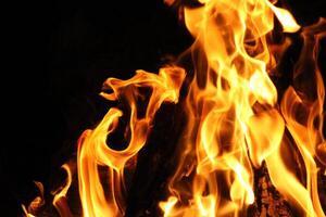 Fire Flames With A Black Background. photo