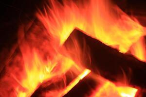 Fire Flames With A Black Background. photo