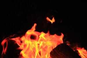 Fire Flames With A Black Background. photo