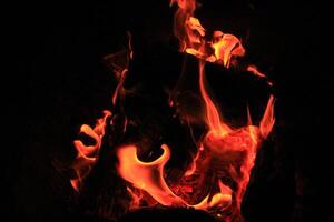Fire Flames With A Black Background. photo