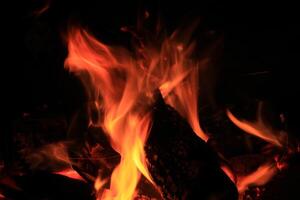 Fire Flames With A Black Background. photo