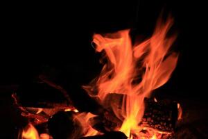 Fire Flames With A Black Background. photo